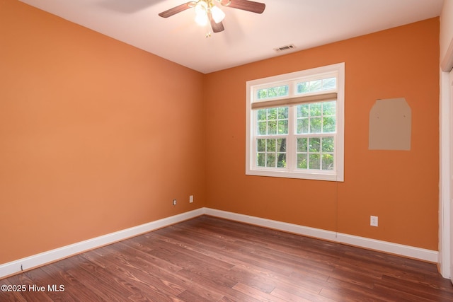 6321 Albatross Dr, New Bern, NC 28560 - unfurnished room featuring dark wood-type flooring, baseboards, and ceiling fan