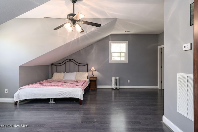 6321 Albatross Dr, New Bern, NC 28560 - bedroom featuring radiator heating unit, wood finished floors, baseboards, lofted ceiling, and ceiling fan