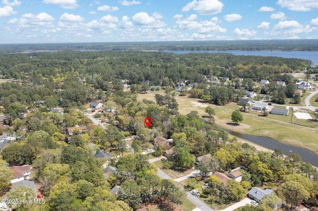 6321 Albatross Dr, New Bern, NC 28560 - aerial perspective of suburban area featuring a nearby body of water and a heavily wooded area
