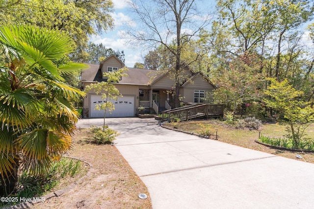 6321 Albatross Dr, New Bern, NC 28560 - view of front of property with driveway, a garage, and roof with shingles