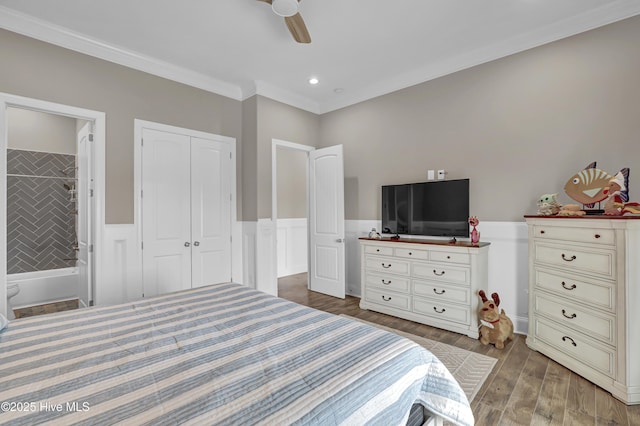 1519 New River Inlet Rd, North Topsail Beach, NC 28460 - bedroom with visible vents, access to exterior, a wainscoted wall, and light wood-style flooring