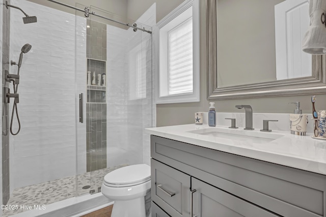 1519 New River Inlet Rd, North Topsail Beach, NC 28460 - bedroom with a decorative wall, a closet, ornamental molding, a wainscoted wall, and dark wood-style flooring