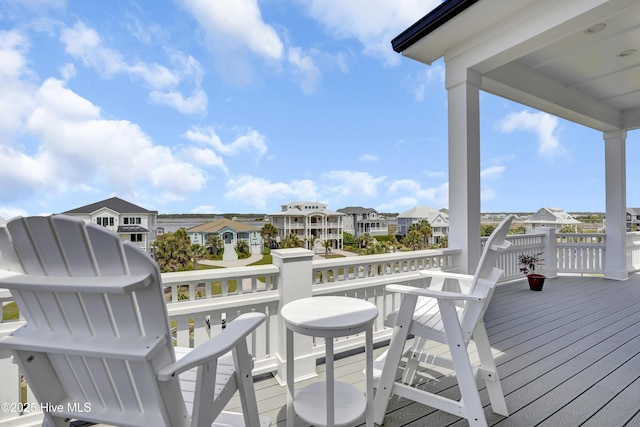1519 New River Inlet Rd, North Topsail Beach, NC 28460 - wooden terrace featuring a residential view