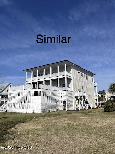 1519 New River Inlet Rd, North Topsail Beach, NC 28460 - back of house with a yard and stairway
