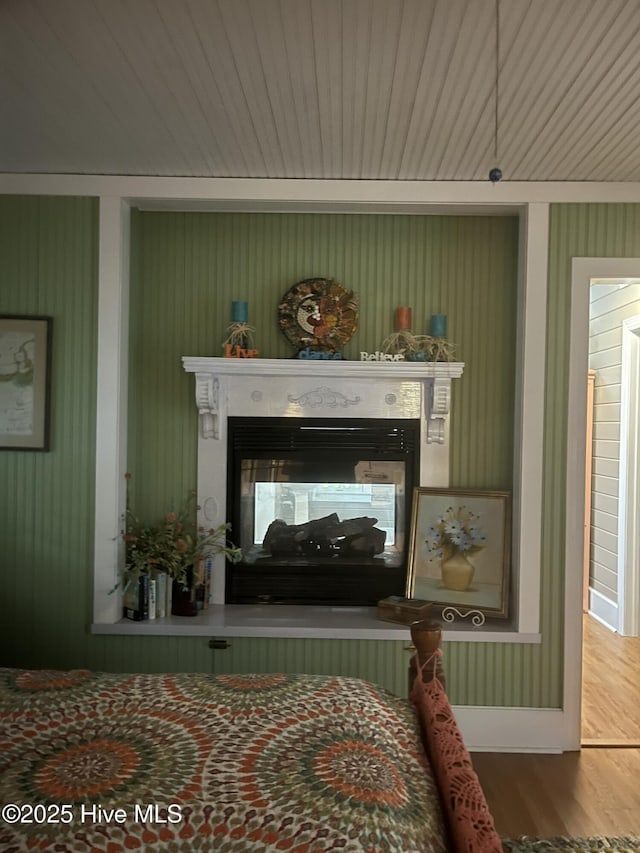42 Brite Ln, Oriental, NC 28571 - interior space with baseboards, a multi sided fireplace, and wood finished floors
