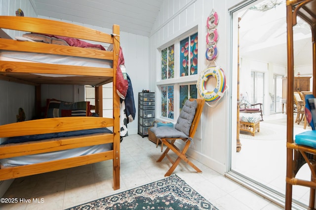 42 Brite Ln, Oriental, NC 28571 - bedroom with tile patterned floors and vaulted ceiling