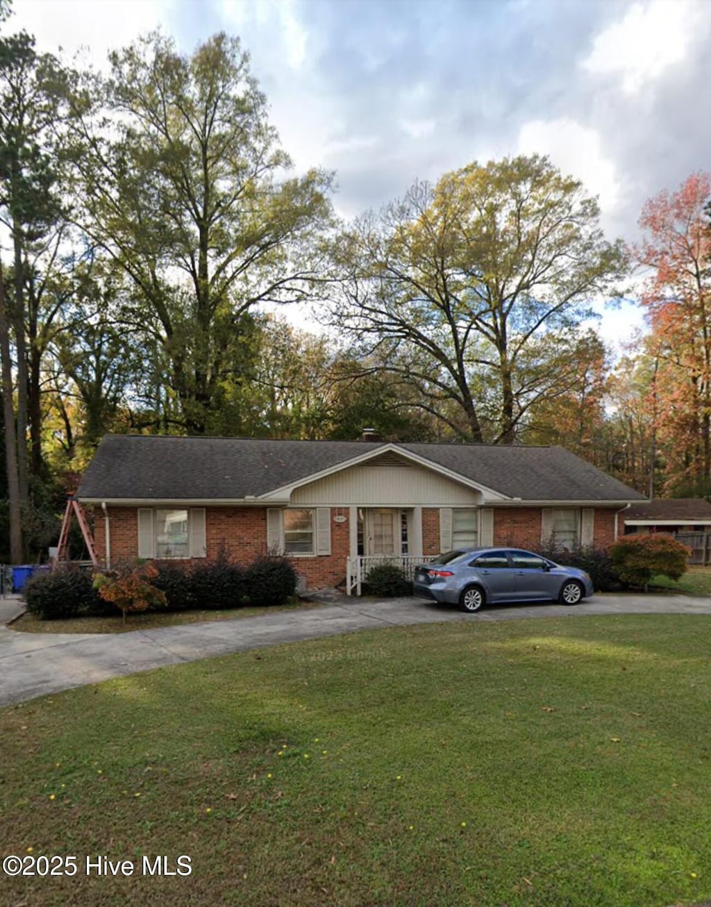 1931 Canal Dr NW, Wilson, NC 27896 - ranch-style house featuring a front yard, brick siding, and driveway