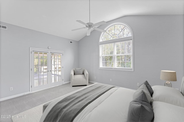 bedroom featuring baseboards, french doors, carpet floors, visible vents, and lofted ceiling