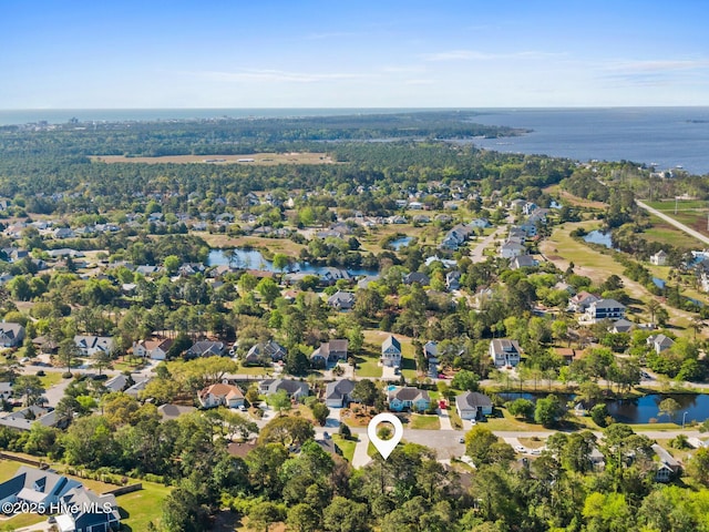 bird's eye view with a water view and a residential view