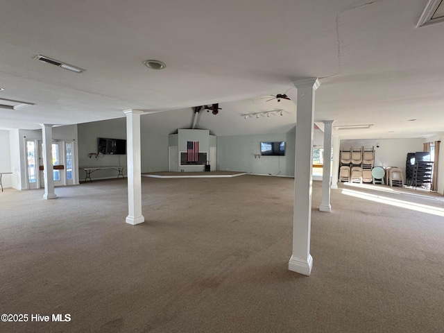 below grade area featuring carpet floors and visible vents