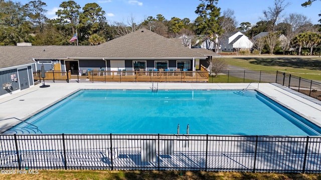 community pool featuring fence
