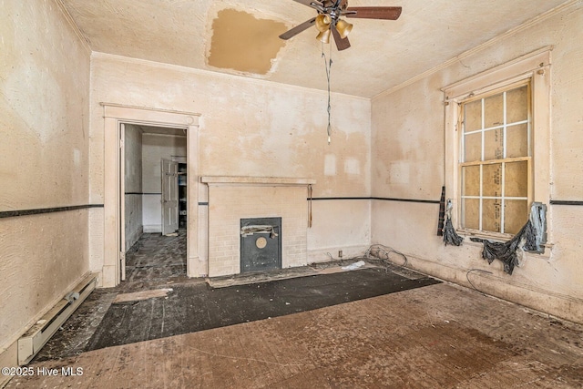 304 Ambler Ave, Rocky Mount, NC 27801 - interior space with crown molding, a ceiling fan, a baseboard heating unit, and a fireplace