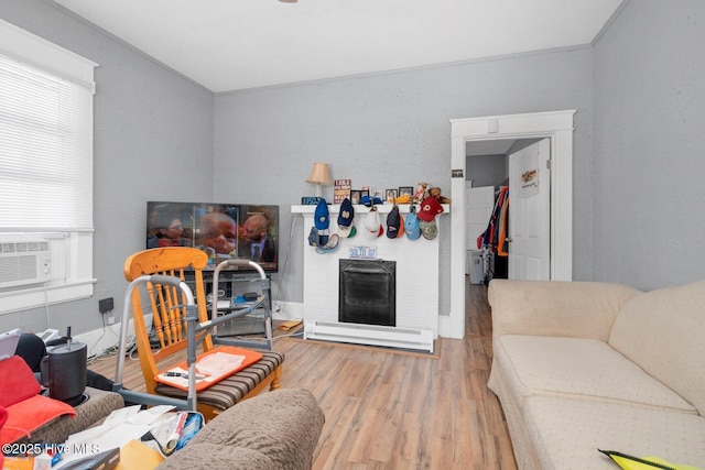 304 Ambler Ave, Rocky Mount, NC 27801 - living area with cooling unit, wood finished floors, and a textured wall