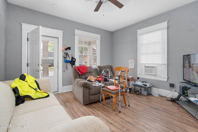 304 Ambler Ave, Rocky Mount, NC 27801 - living room featuring cooling unit, wood finished floors, ceiling fan, and baseboards
