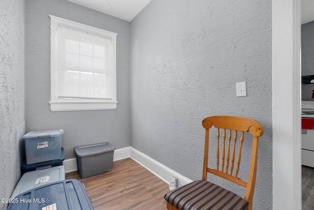 304 Ambler Ave, Rocky Mount, NC 27801 - sitting room featuring baseboards and wood finished floors