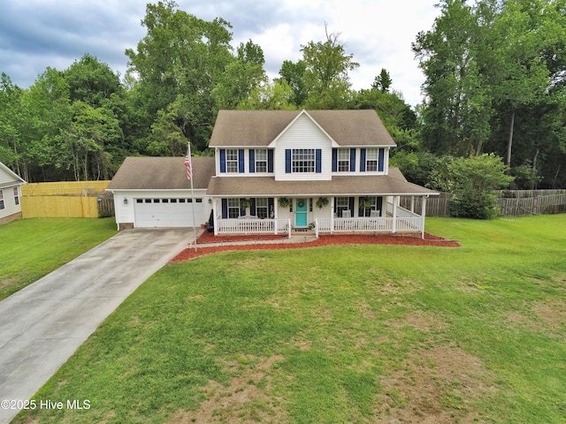view of front facade with fence, covered porch, driveway, and a front lawn