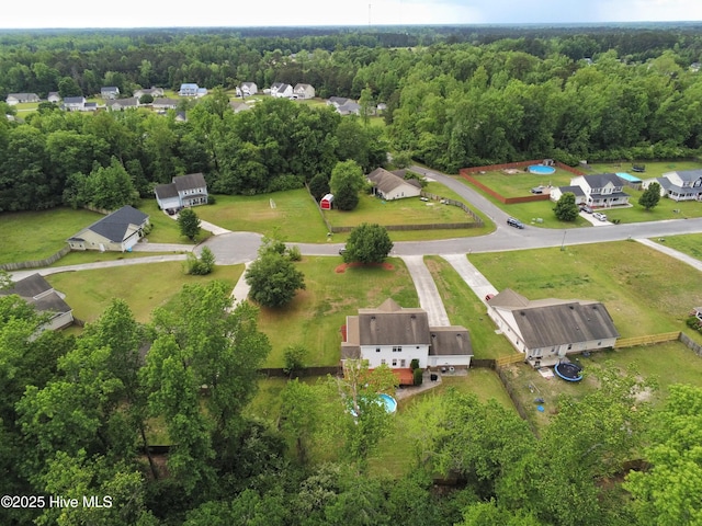 aerial view featuring a view of trees