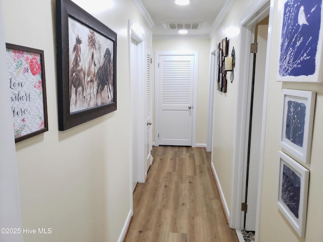 504 E S St, Fremont, NC 27830 - hallway featuring ornamental molding, light wood-style flooring, baseboards, and recessed lighting