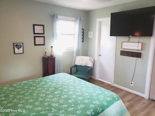 504 E S St, Fremont, NC 27830 - bedroom with wood finished floors and baseboards