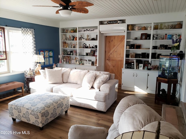 504 E S St, Fremont, NC 27830 - living area with a ceiling fan, wood finished floors, an AC wall unit, wood ceiling, and built in shelves