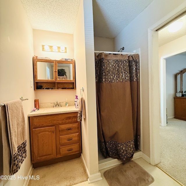 501 Blackfoot Trl, Edenton, NC 27932 - full bathroom with a shower with shower curtain, a textured ceiling, and vanity