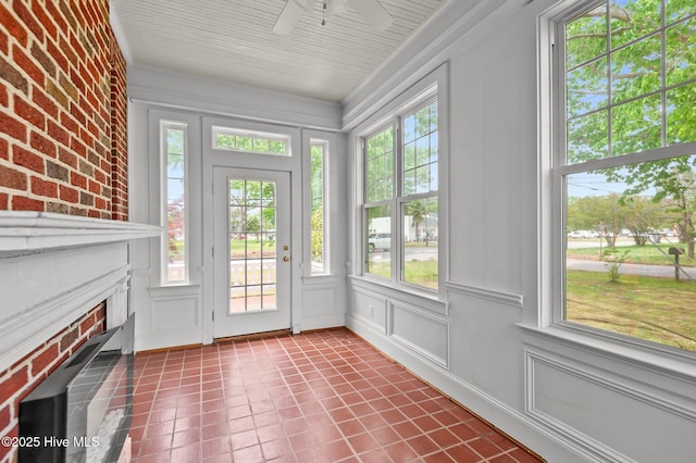 306 N Parker St, Elm City, NC 27822 - unfurnished sunroom featuring tile patterned floors and a decorative wall