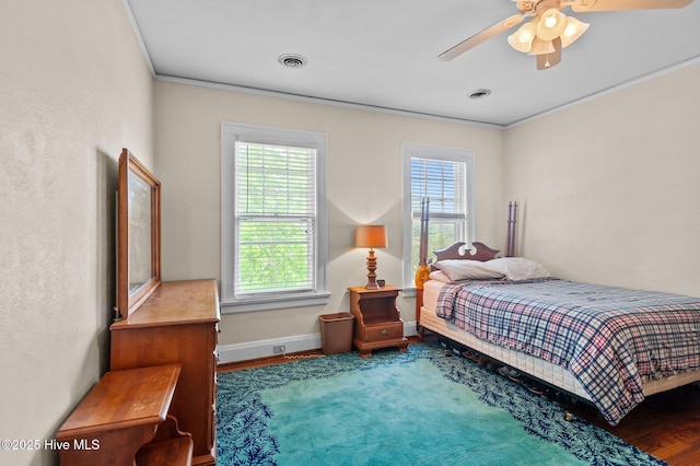 306 N Parker St, Elm City, NC 27822 - bedroom featuring ceiling fan, baseboards, wood finished floors, and ornamental molding