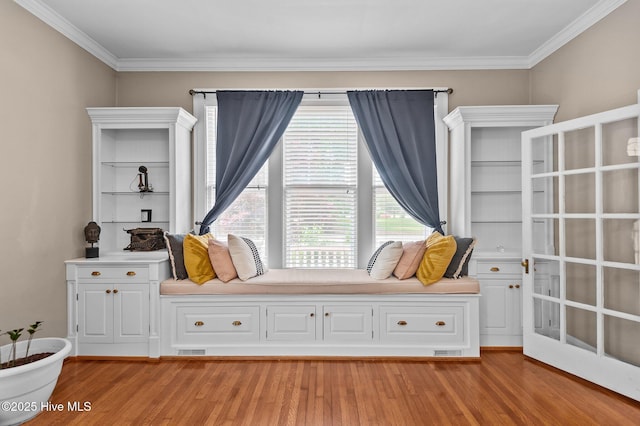 306 N Parker St, Elm City, NC 27822 - sitting room featuring crown molding, light wood-style floors, and visible vents