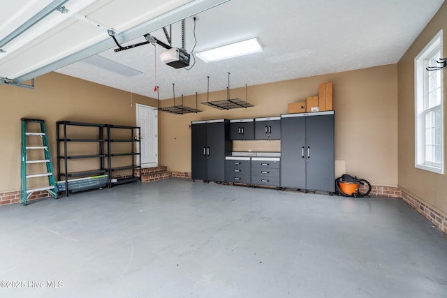 155 Patricia Ct, Whispering Pines, NC 28327 - garage featuring a garage door opener