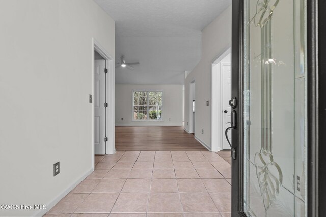 155 Patricia Ct, Whispering Pines, NC 28327 - corridor featuring light tile patterned floors and baseboards