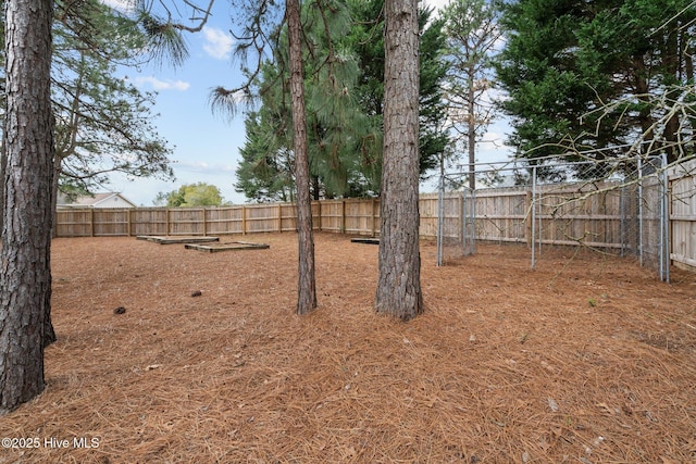 155 Patricia Ct, Whispering Pines, NC 28327 - view of fenced backyard