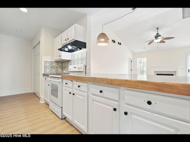 711 Glenarthur Dr, Wilmington, NC 28412 - kitchen with white electric stove, under cabinet range hood, light wood-style flooring, ceiling fan, and tasteful backsplash