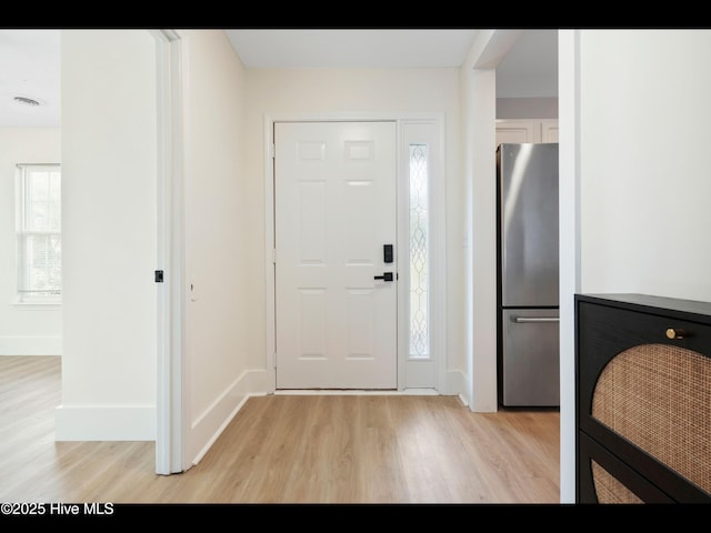 711 Glenarthur Dr, Wilmington, NC 28412 - foyer featuring light wood-style floors and baseboards