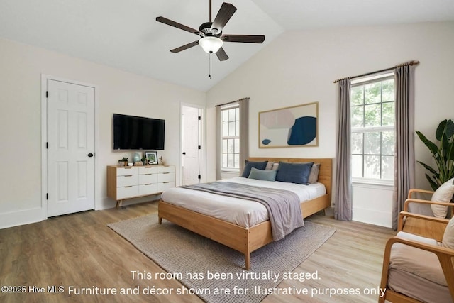 711 Glenarthur Dr, Wilmington, NC 28412 - bedroom with light wood finished floors, lofted ceiling, and a ceiling fan