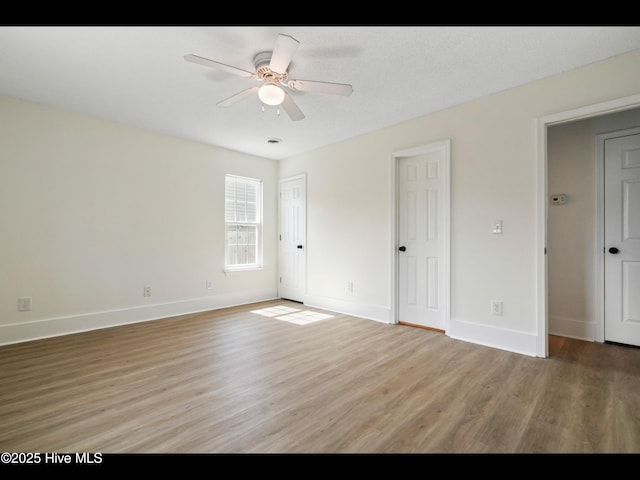 711 Glenarthur Dr, Wilmington, NC 28412 - unfurnished bedroom featuring light wood-style floors and baseboards