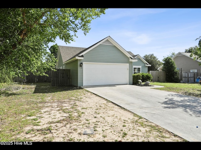 711 Glenarthur Dr, Wilmington, NC 28412 - view of property exterior featuring driveway, an attached garage, and roof with shingles