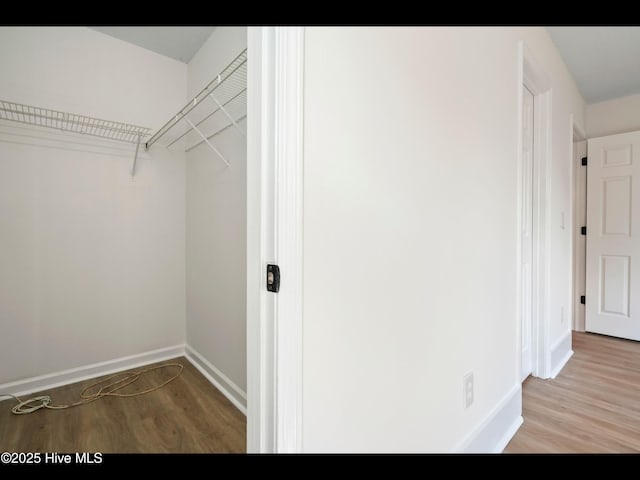 711 Glenarthur Dr, Wilmington, NC 28412 - walk in closet with light wood finished floors