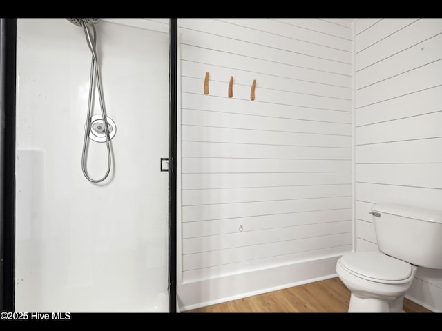711 Glenarthur Dr, Wilmington, NC 28412 - bathroom with wood finished floors, toilet, and a shower stall