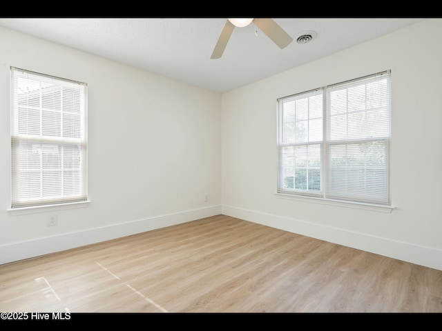 711 Glenarthur Dr, Wilmington, NC 28412 - spare room featuring wood finished floors, baseboards, and ceiling fan