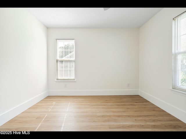 711 Glenarthur Dr, Wilmington, NC 28412 - unfurnished room featuring wood finished floors and baseboards