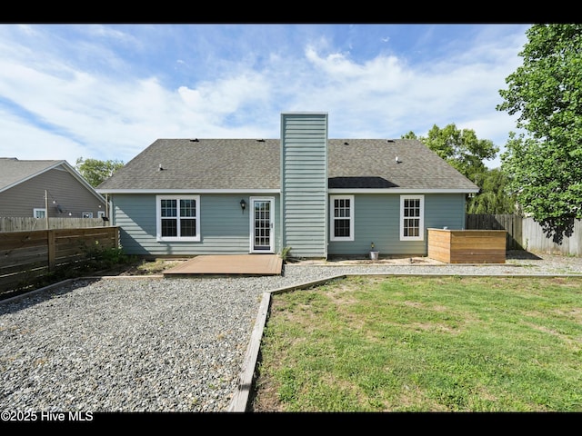 711 Glenarthur Dr, Wilmington, NC 28412 - rear view of property with a patio, a chimney, and roof with shingles