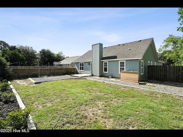 711 Glenarthur Dr, Wilmington, NC 28412 - back of house with a patio area, a chimney, and roof with shingles