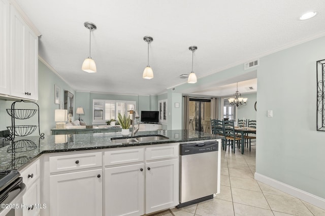 kitchen with a sink, white cabinets, crown molding, visible vents, and appliances with stainless steel finishes