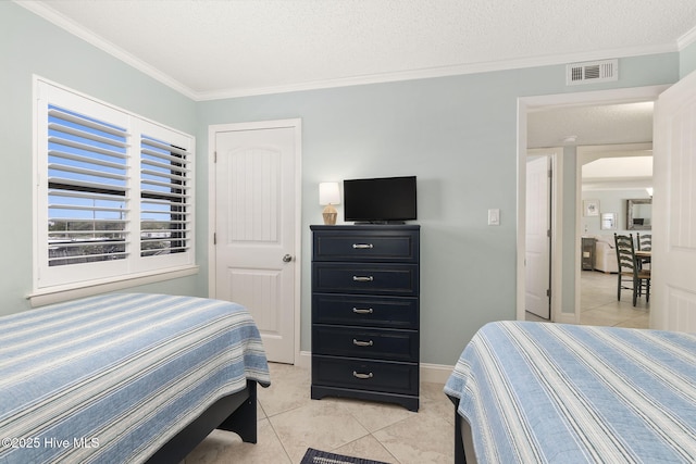 bedroom featuring ornamental molding, light tile patterned floors, and visible vents