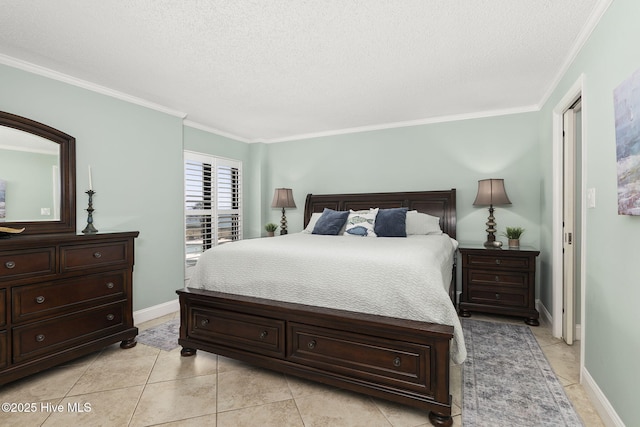 bedroom with light tile patterned floors, baseboards, crown molding, and a textured ceiling