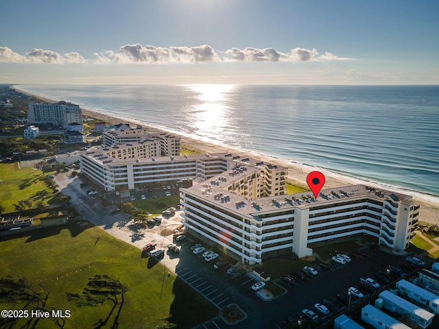 aerial view featuring a beach view and a water view