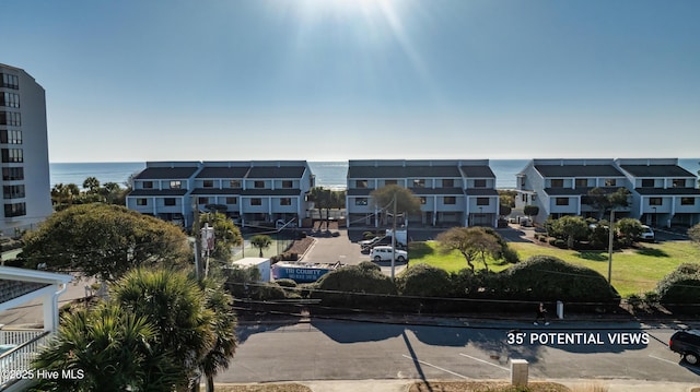 view of property with a water view