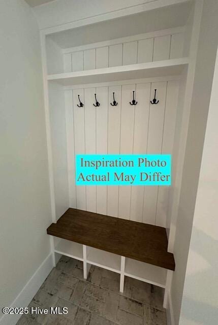 mudroom featuring baseboards