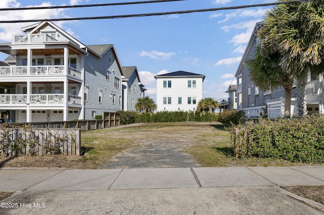 view of street featuring a residential view and driveway
