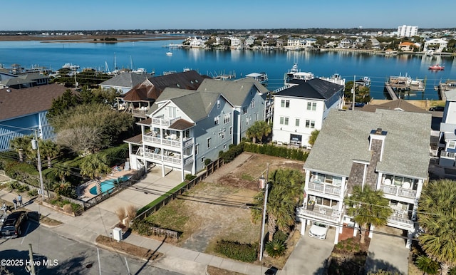 drone / aerial view with a water view